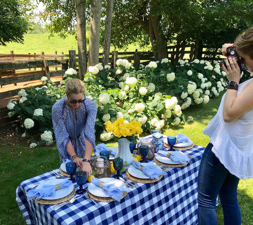 Blue-and-white dining table styled with the You Blue Me Away kit without vases