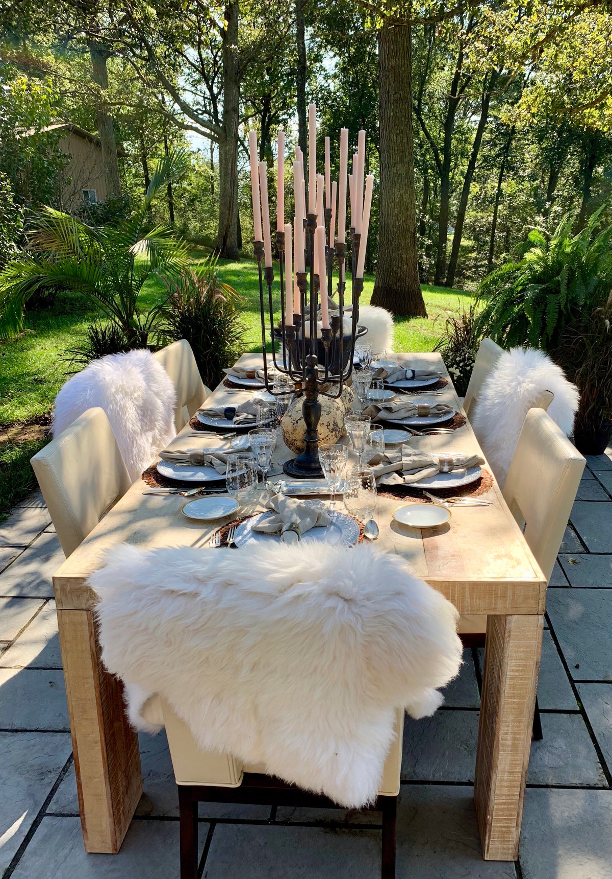 Antiqued iron 13-taper candelabra styled as a dramatic table centerpiece